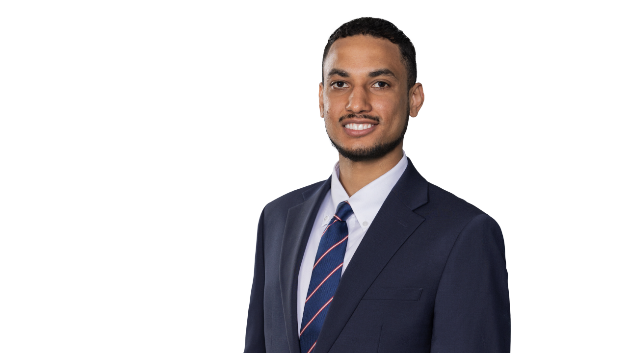 Jordan Evans firm headshot.