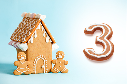Gingerbread house next to the number three