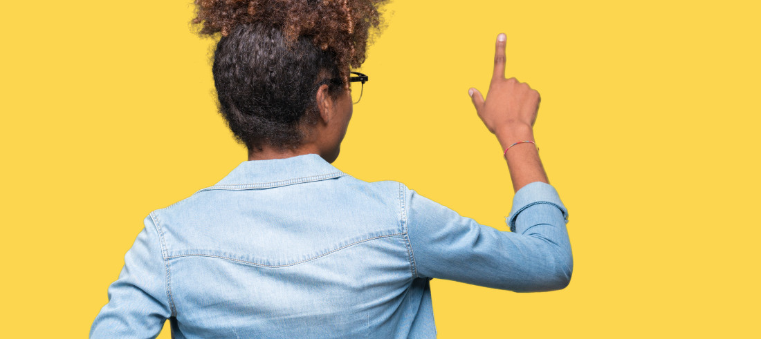 African Amercian Woman with Glasses Pointing