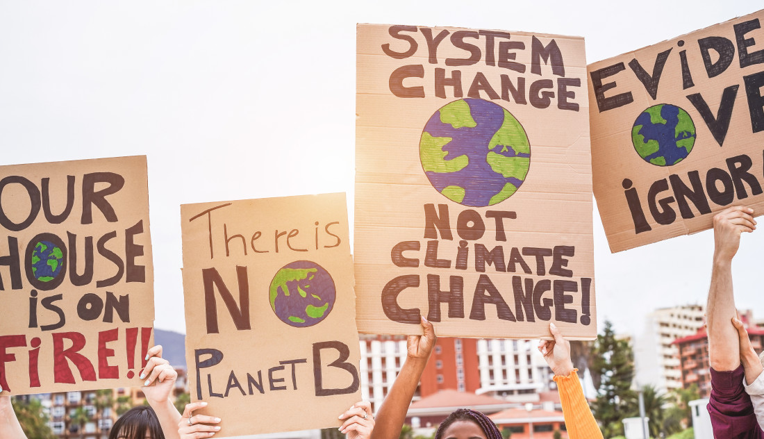 Group of demonstrators on road, young people from different culture and race fight for climate change - Global warming and environment concept